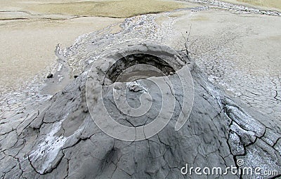Mud volcano erupting with dirt, vulcanii Noroiosi in Buzau, Romania Stock Photo